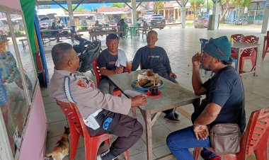 Personel Polsek KSKP Tembilahan Terus Mensosialisasikan Pemilu Damai dan Mendorong Warga untuk Menjaga Keamanan dan Ketertiban