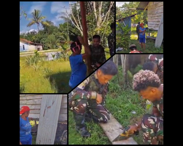 Satgas Yonif 763/SBA Perbaiki Tangga Rumah Warga di Suswa