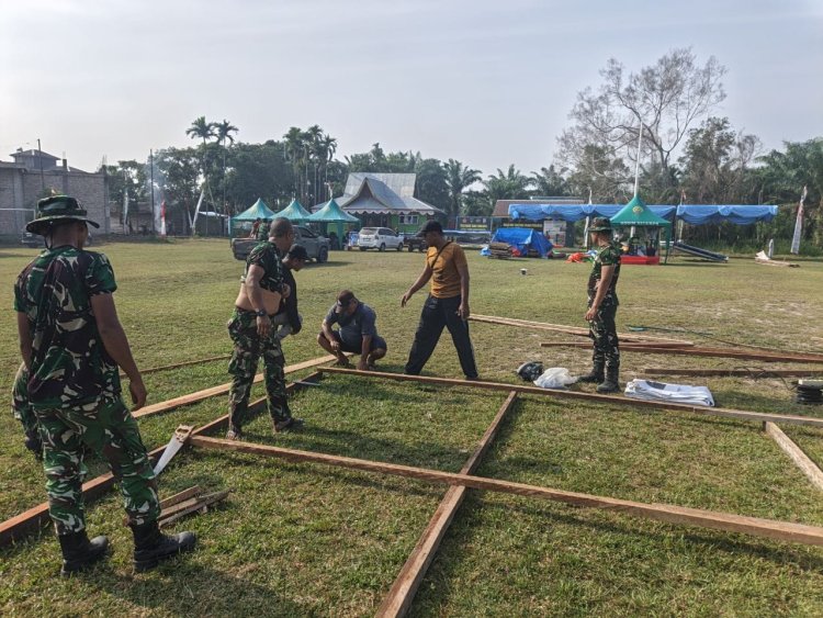 Jelang Penutupan TMMD ke-129 Kodim 0313/KPR, Satgas Gelar Persiapan Upacara di Lapangan Kantor Desa Pangkalan Terap